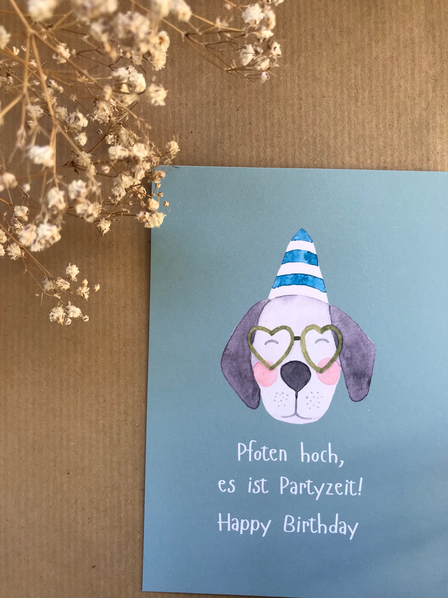 Postkarte „Pfoten hoch, es ist Partyzeit!“